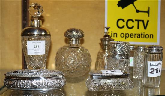 8 silver topped toilet jars etc